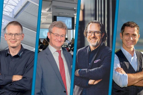 Vier Personen stehen nebeneinander