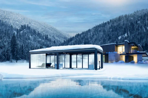 Wintergarten im Garten und umgeben von Schnee